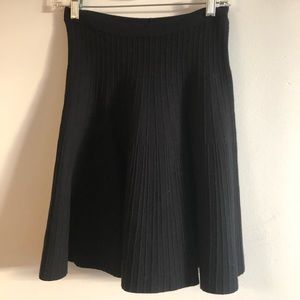 Elegant black trumpet skirt with lots of movement